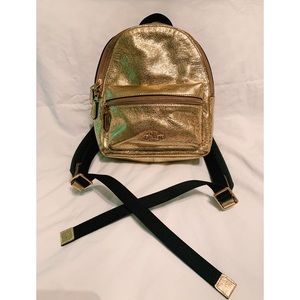 Coach gold backpack